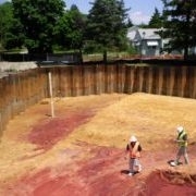 construction workers in dirt pit