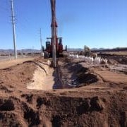 construction crane in dirt