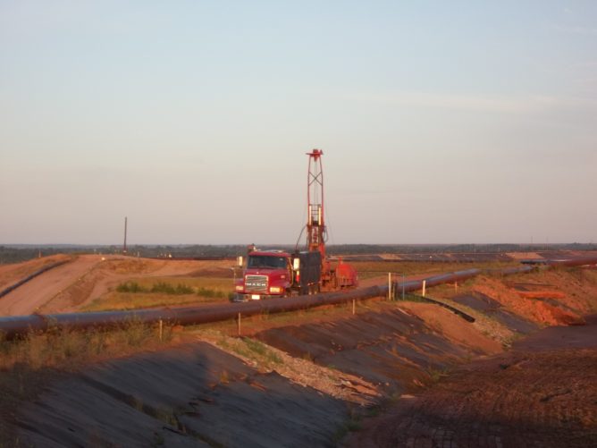 truck on basin site at sunset