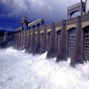 water streaming through dam wall