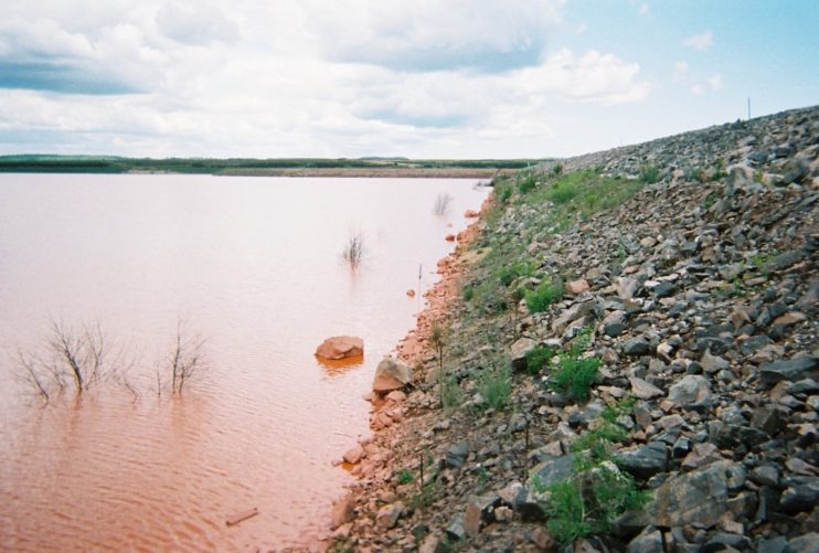 stream with rocky hill on right