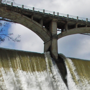 water spilling over wall