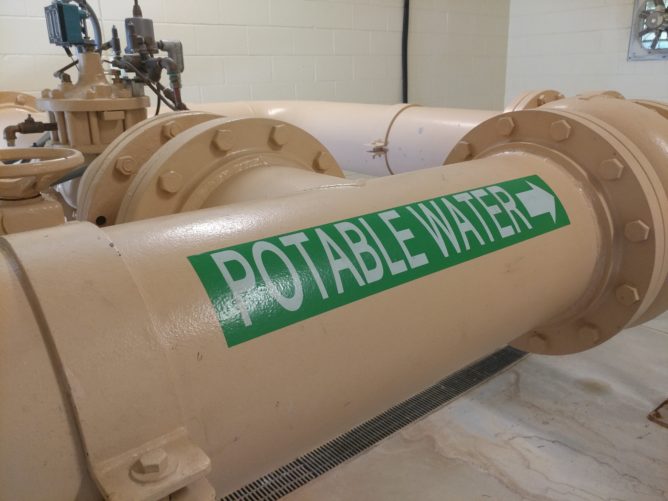 pipe with Potable Water label