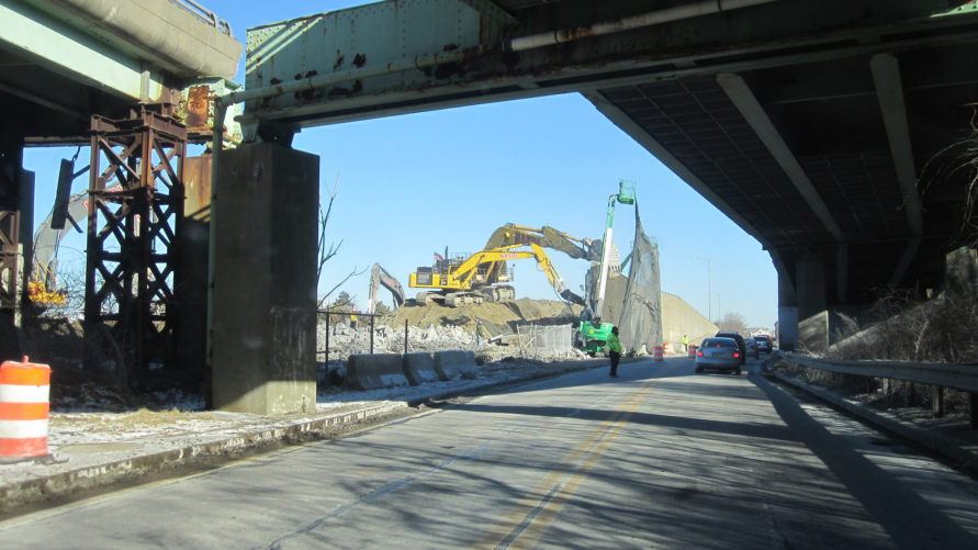 construction crane under a bridge