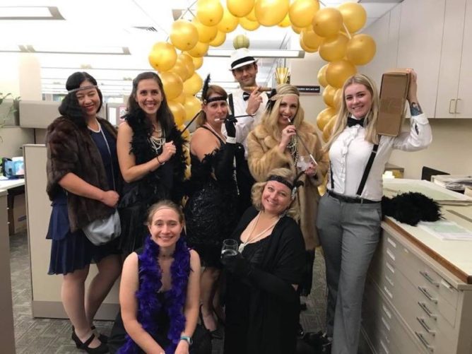 GEI Consultants employees in various Halloween costumes