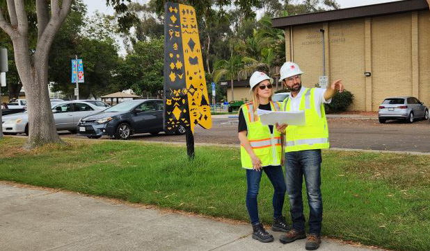 Consultants reviewing map at job site