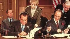 Nixon and Trudeau Signing Agreement