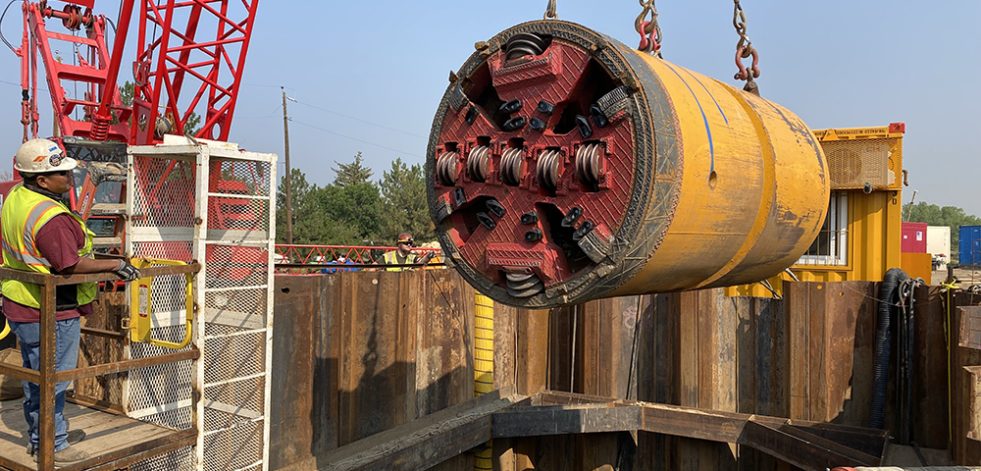 Pipeline cutterhead being installed by crane
