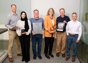 People holding awards