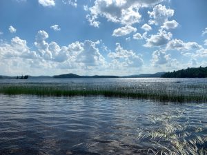 Lake with blue sky and clouds